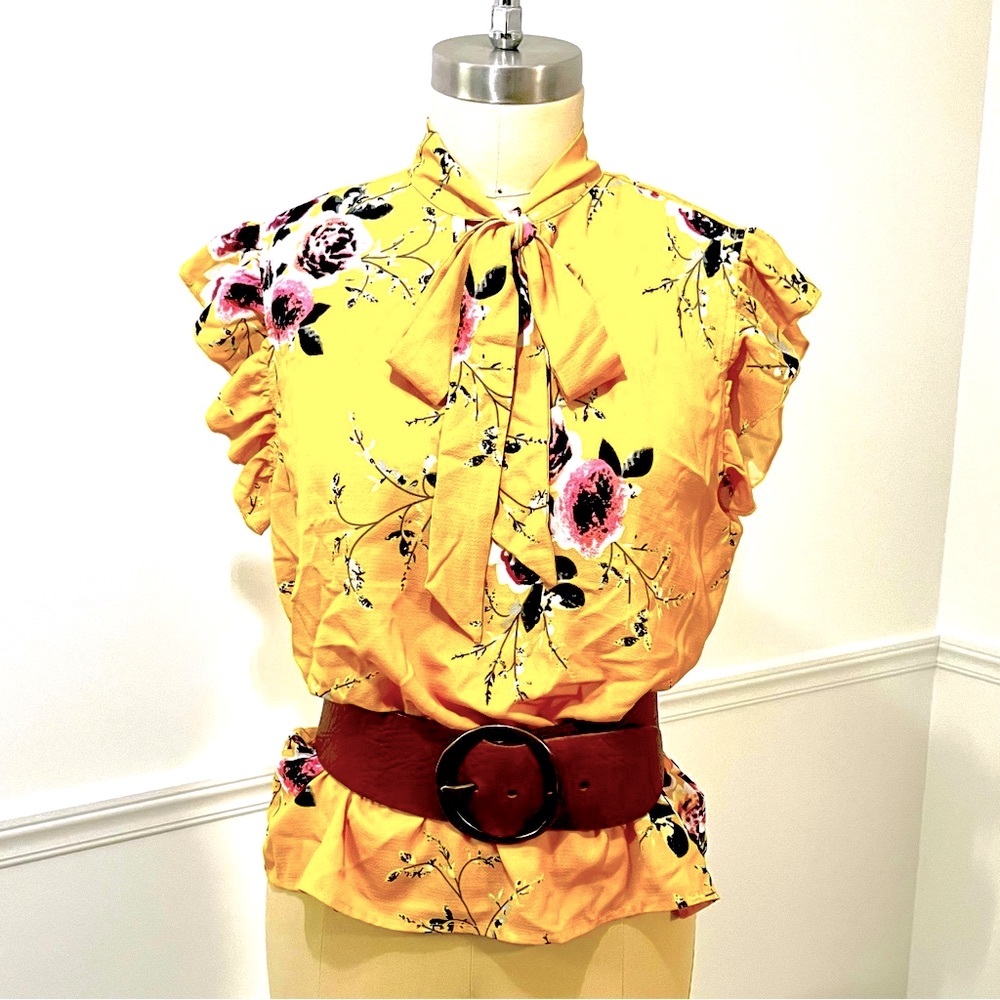Bright yellow with flower print ruffles sleeveless blouse